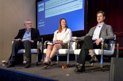 3panelmemberssittingonstage
